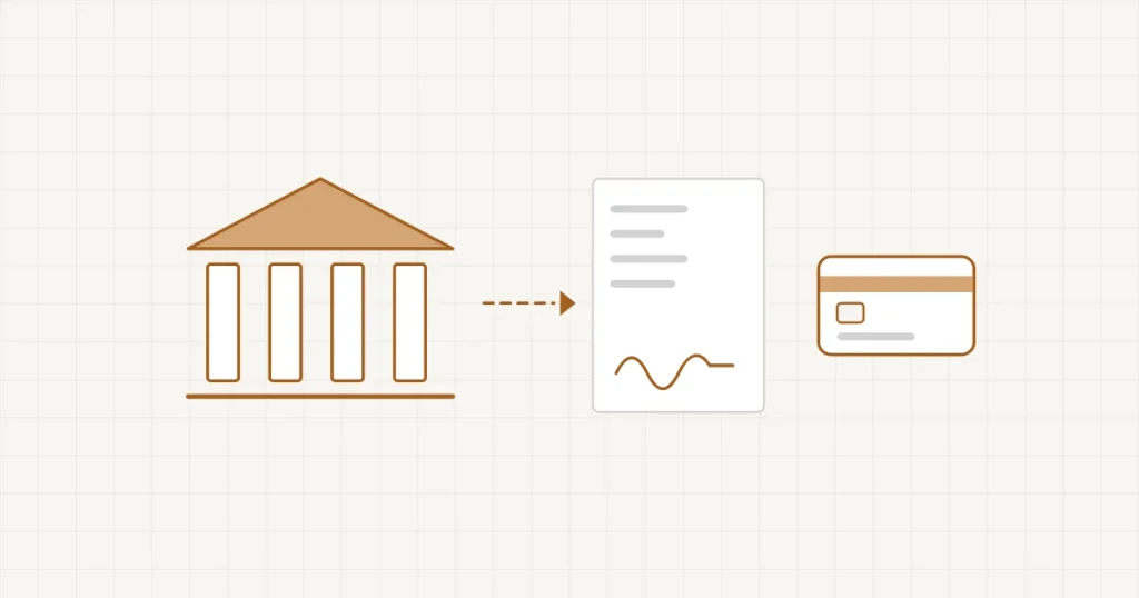 Un contrat déroulé entre une main qui signe et un bâtiment de banque, avec une carte bancaire qui passe entre les deux