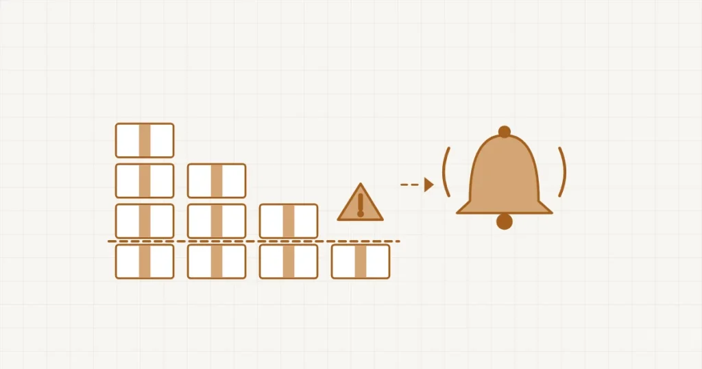 Être prévenu avant une rupture de stock : des piles de cartons qui baissent sous un seuil en pointillés, et une cloche qui sonne